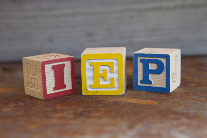 closeup shot of the I E P block letters